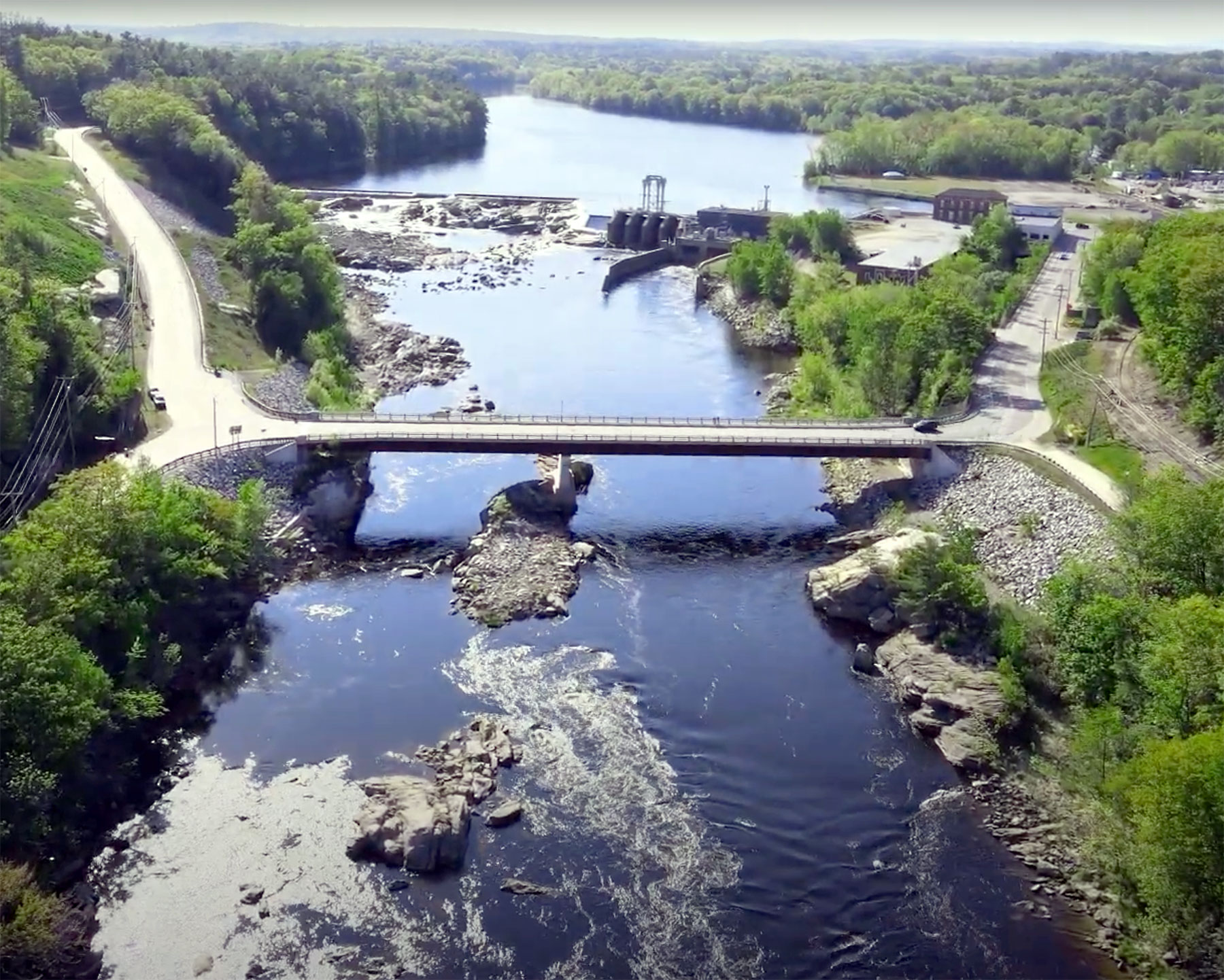 Lisbon Falls along side the Androscoggin with the Worumbo Dam in the distance.