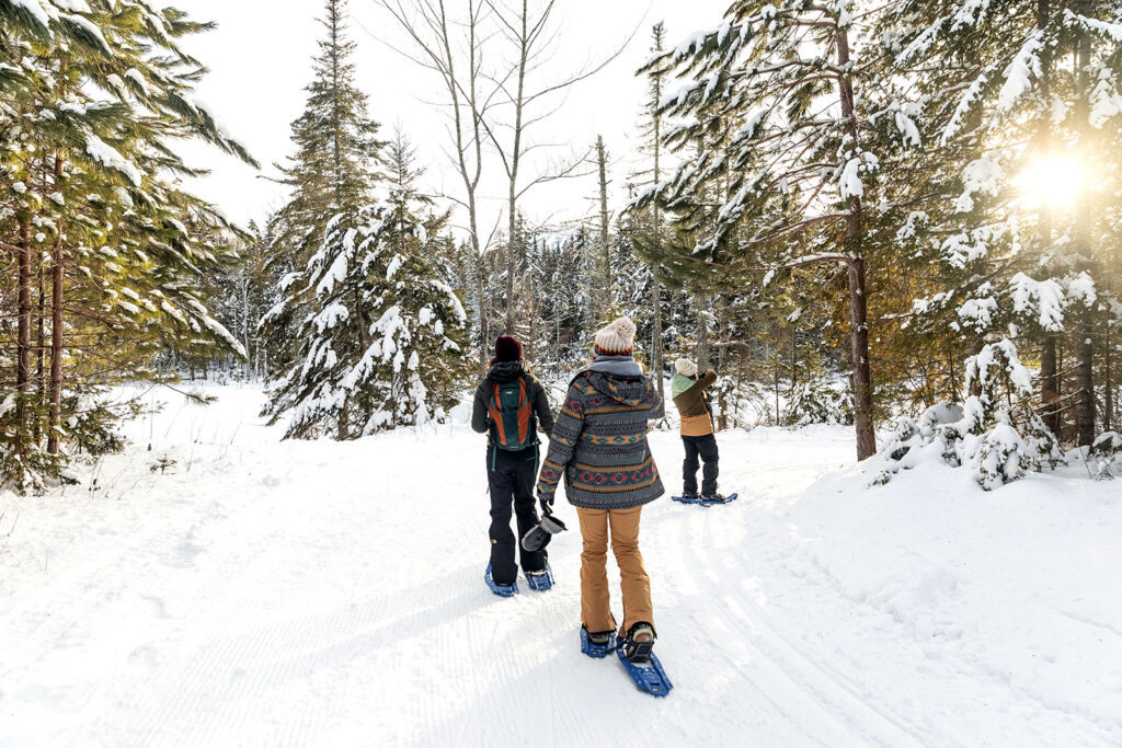 Snowshoeing on the trails of Sunday River Outdoor Center