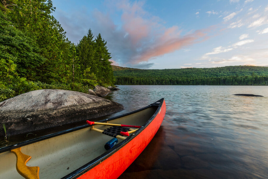 Canoe on the shore of lake in Bald Mountain Township near Rangeley